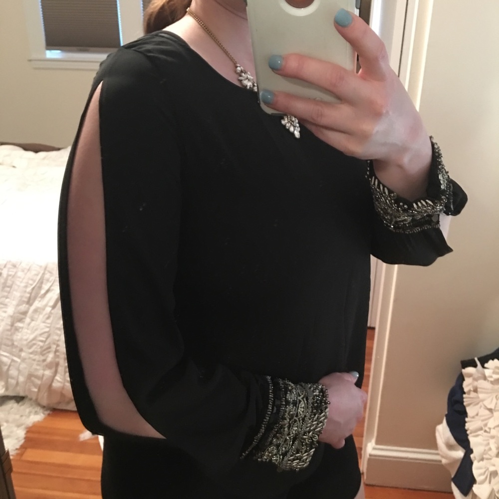 black top with open arms and jeweled sleeves L
